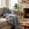 Manta peluche gris